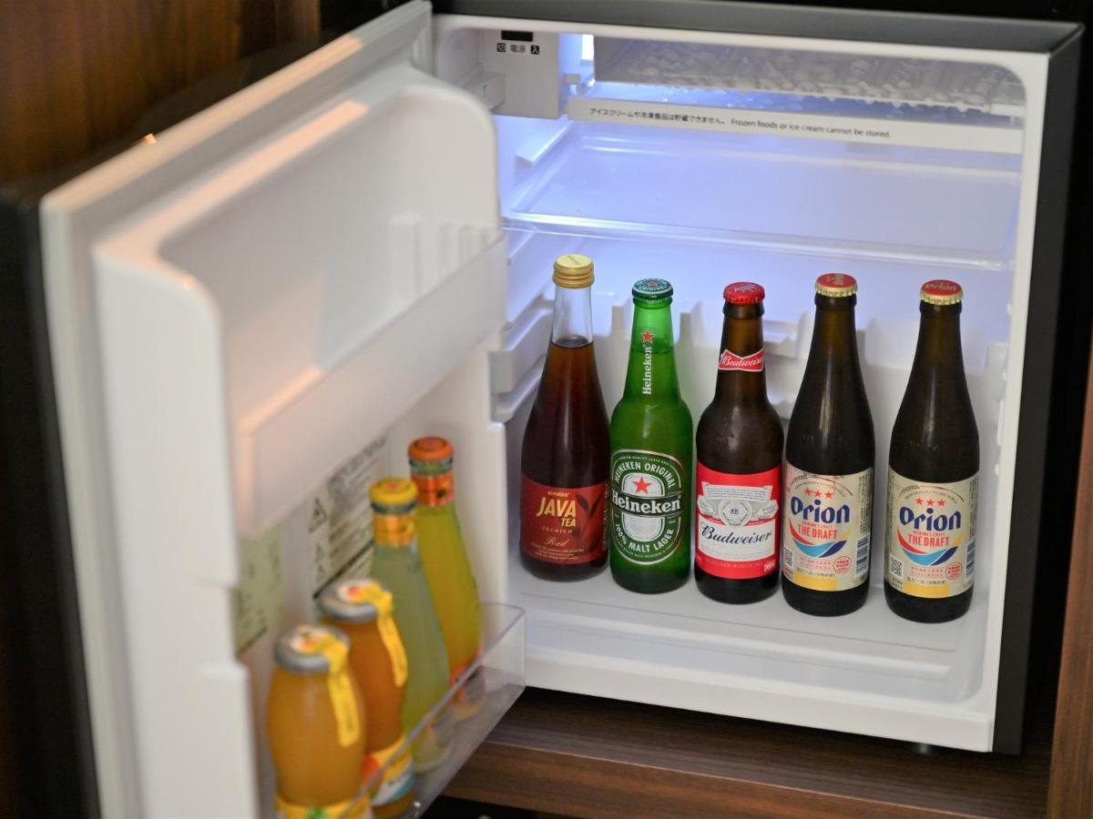 Ryukyu Hotel & Resort Nashiro Beach Itoman Εξωτερικό φωτογραφία A small refrigerator with beer bottles